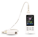 A white handheld oximeter with a colorful display screen showing readings, connected by a cable to a matching white clip-on sensor, photographed on a clean white background.