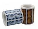 Two rolls of intravenous label ribbon with checkered and striped patterns.